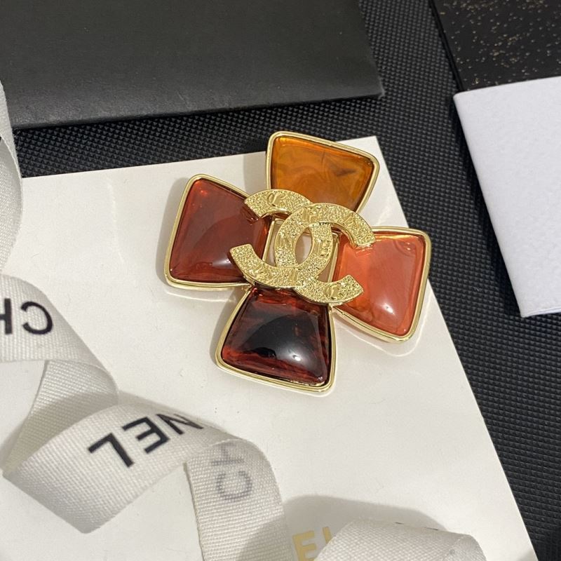 Ch*el brooches
